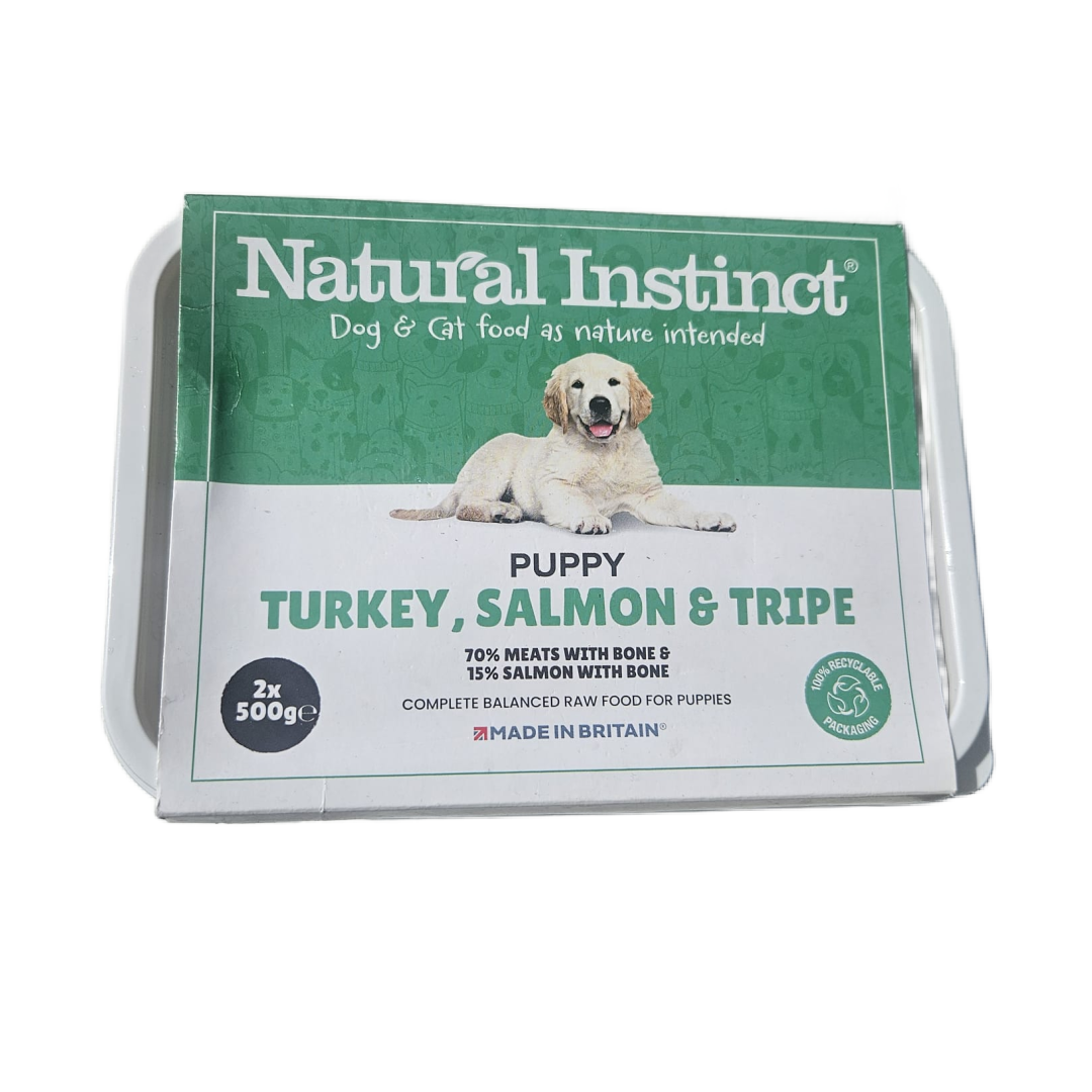 Package of Natural Instinct puppy food with a golden retriever on the label